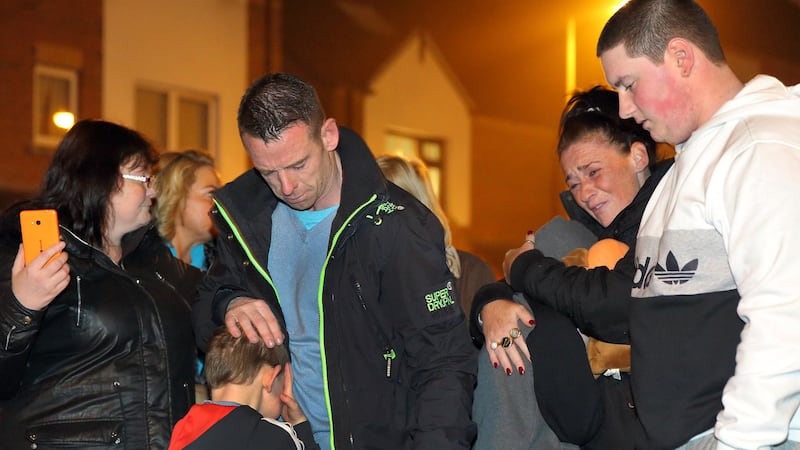 The family of murdered teenager Christopher Meli comfort each other at a vigil in his memory&nbsp;