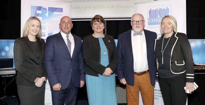 Dee Stitt (second from left) with Arlene Foster in 2016 during an announcement of &pound;1.7 million of SIF funding to Charter NI. Also pictured are DUP councillor Sharon Skillen, Charter NI chairman Drew Haire and project manager Caroline Birch.