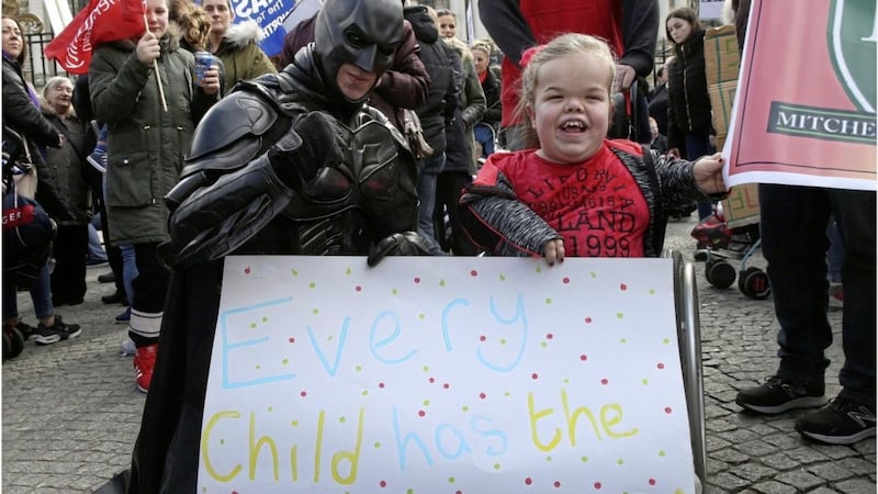 Protest: Parents, pupils, staff and unions protest at Belfast City Hall to save special needs schools after it was announced that schools could be merged 	 	 Picture: Hugh Russell 