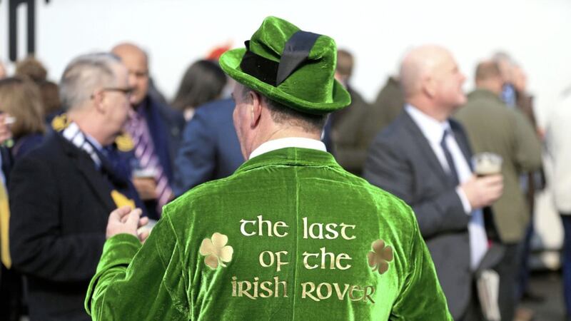 A racegoer on St Patrick&#39;s Thursday at Cheltenham Racecourse. Research shows Irish punters spent &euro;22 million attending the Cheltenham Festival last year, according to a new study PICTURE: Mike Egerton/PA 