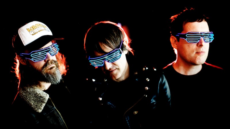 Downpatrick indie rock trio Ash model the latest in glow-in-the-dark eyewear