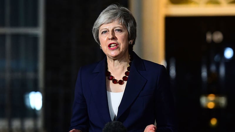 Prime Minister Theresa May makes a statement outside 10 Downing Street confirming that her cabinet has agreed the draft Brexit withdrawal agreement. Picture by Victoria Jones/PA Wire&nbsp;