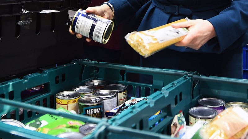 The Trussell Trust said food banks have given out a record 1.5 million emergency parcels in a six-month period (Andy Buchanan/PA)