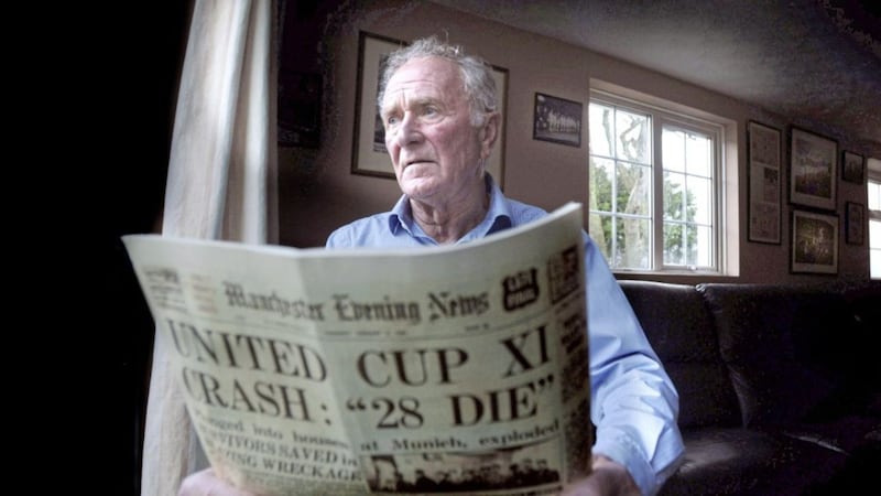 Former Manchester United goalkeeper Harry Gregg pictured reading a copy of the Manchester Evening News at his home near Coleraine in 2008. Picture by Charles McQuillan/Pacemaker 