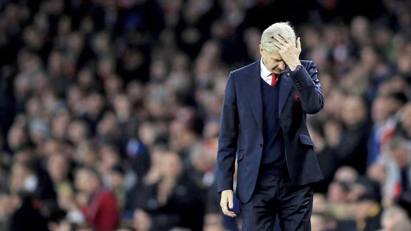 Arsenal boss Arsene Wenger has called on his team to stay together as they aim to bounce back from their humiliating defeat to Bayern Munich at Sutton United Picture: AP