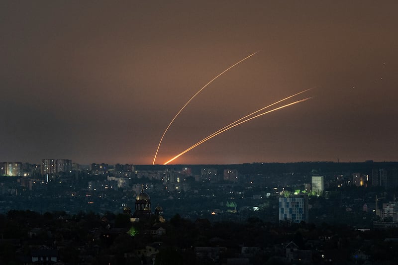 Russian rockets are launched against Ukraine from Russia’s Belgorod region, seen from Kharkiv, on Thursday (Evgeniy Maloletka/AP)