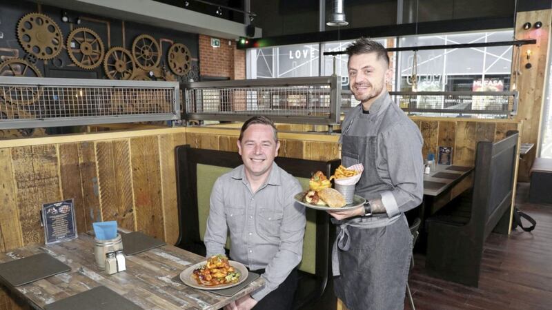 Restaurant owner Darren Clarke and head chef James Lynas celebrate the opening of Moes Grill at The Boulevard. Photo: Declan Roughan/PressEye 