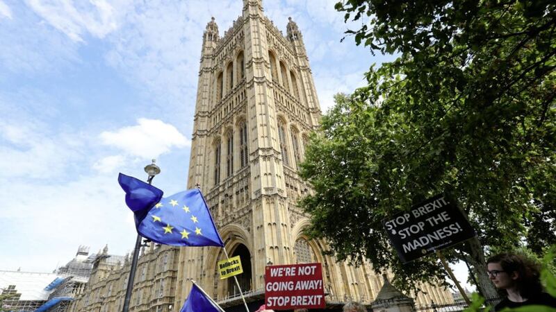 Anti-Brexit protesters outside the Houses of Parliament yesterday. Picture by Aaron Chown, Press Association 