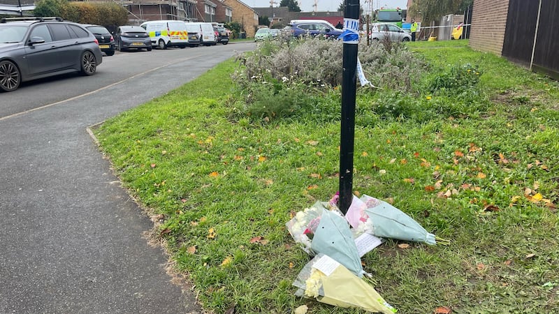 Flowers and tributes were left at the scene of the house fire in Hounslow (George Lithgow/PA)