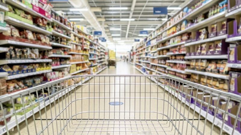 Unrecognizable supermarket aisle as background 