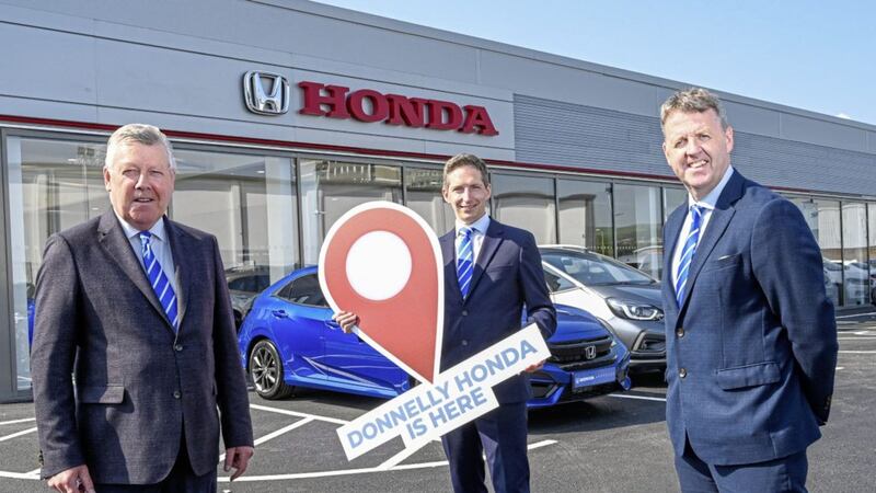 Terence Donnelly, Paul Compton and Dave Sheeran at the new Donnelly Honda showroom on the Boucher Road, Belfast 