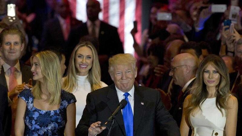 Republican presidential candidate Donald Trump is joined by his wife Melania, right, and daughter Ivanka, left, as he arrives for a primary night news conference in New York. Picture by Mary Altaffer/AP 