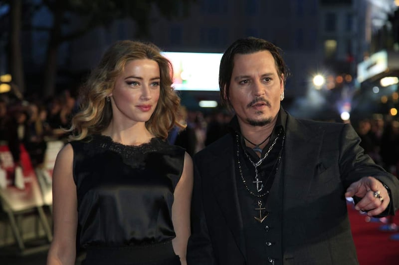 Amber Heard and Johnny Depp at a premiere (Jonathan Brady/PA)