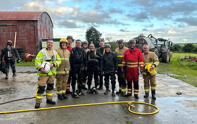 John Holmes left his retirement party to help rescue the calves. Picture by NIFRS