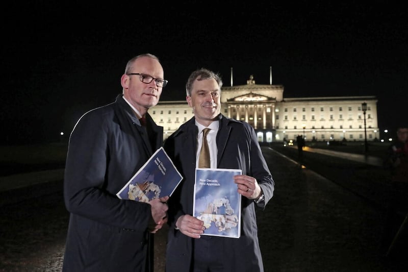 Then Foreign Affairs minister Simon Coveney (left) and Secretary of State Julian Smith announce the New Decade, New Approach agreement in January 2020