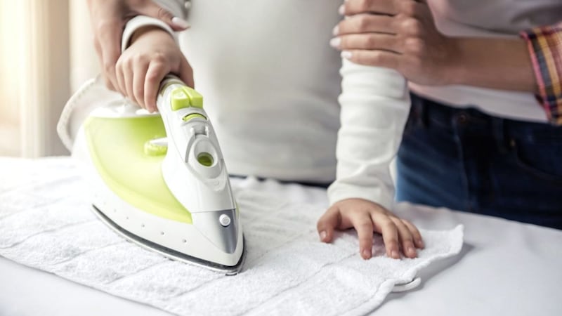 Research suggests children should start helping with chores such as ironing at age 10 