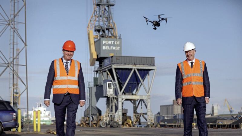 FLASHBACK TO 2020: Paul Murnaghan, regional director for BT&rsquo;s Enterprise division in Northern Ireland, and Joe O&rsquo;Neill, chief executive of Belfast Harbour, with 5G remote controlled inspection technology, which will improve productivity and safety measures by reducing the need for staff to work at height. Picture: Matt Mackey/Press Eye 