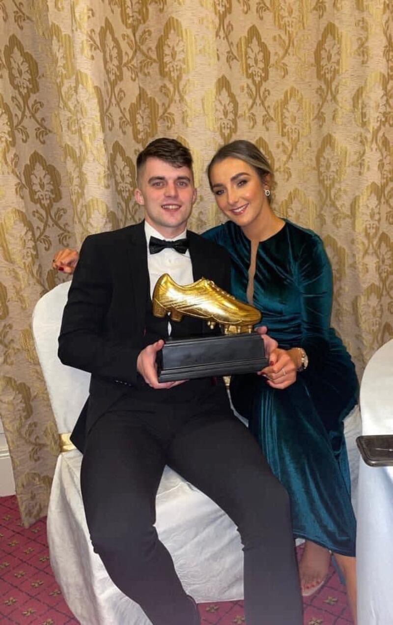 Matty and Ciara celebrate with the Golden Boot as top-scorer for Kildress