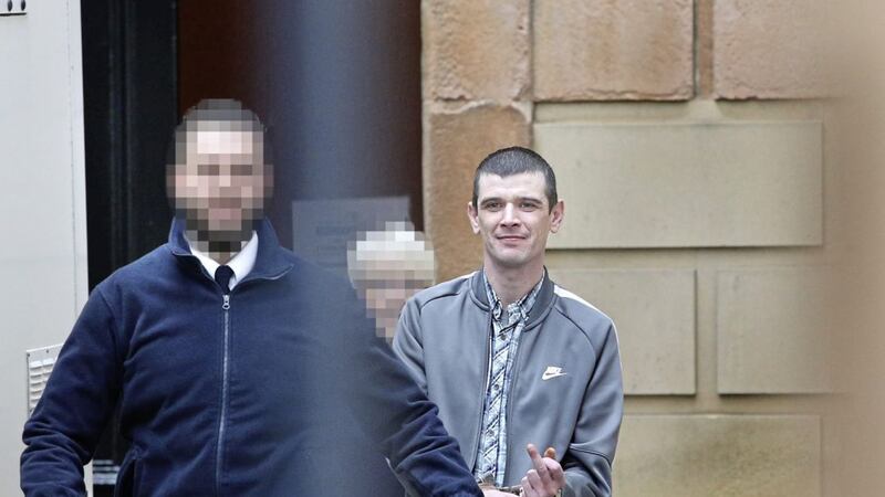 Stephen McCarron leaving Derry Crown Court after being jailed for biting his girlfriend&#39;s nose and attacking her 