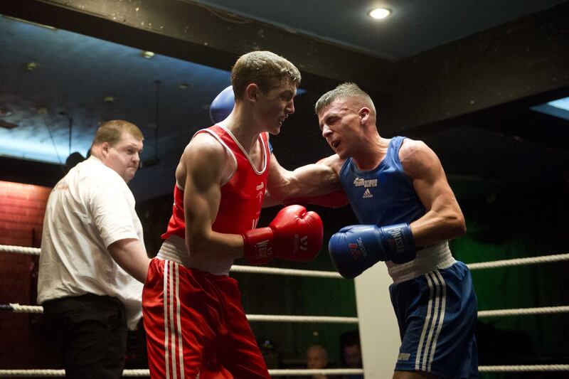 Colm Murphy (red) was impressive en route to victory over Monkstown's Conor Kerr last night. The St George's ace will now meet Star's JP Hale in the 57kg decider on January 19. Picture by Mark Marlow