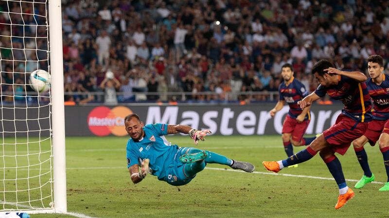 Barcelona's Pedro Rodriguez scores the winner past Sevilla goalkeeper Beto during Tuesday's Uefa Super Cup clash<br />Picture: PA