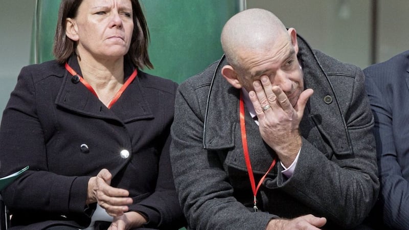 Paul Comerford, the brother of Jonathan Ball (3), who along with Tim Parry (12) was killed after the Warrington bombing, wipes his eyes during the 25th anniversary service