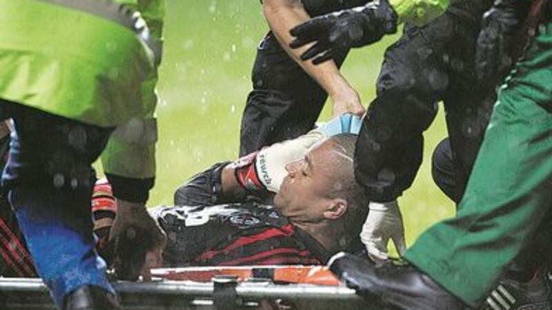 AC Milan's goalkeeper Nelson Dida lays injured after Celtic's winning goal during the Uefa Champions League Group D match at Celtic Park Glasgow on Wednesday October 3 2007