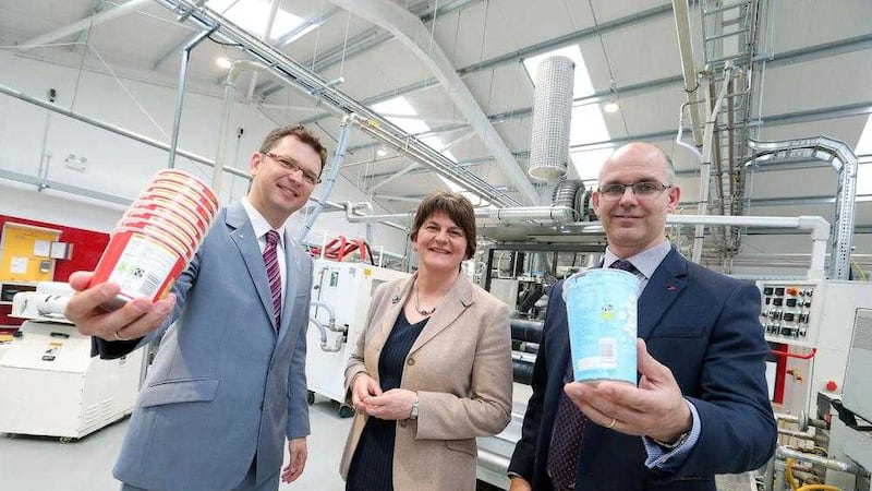First Minister Arlene Foster is pictured with outgoing CEO Jarek Zasadzinski, left and incoming CEO Philip Woolsey as she opened the new manufacturing hall at Greiner Packaging, Dungannon 