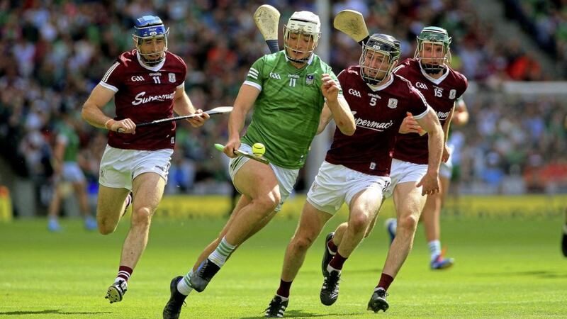 Limerick's  Kyle Hayes being pursued by Galway's Padraic Mannion, Conor Cooney and Cathal Mannion at Croke Park Picture:&nbsp; Seamus Loughran.
