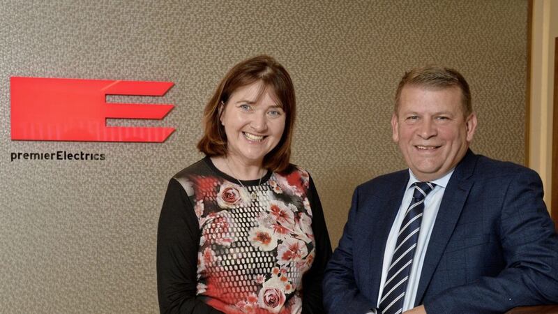 Premier Electrics&#39; managing director Tony Shivers with Invest NI regional manager Ethna McNamee 