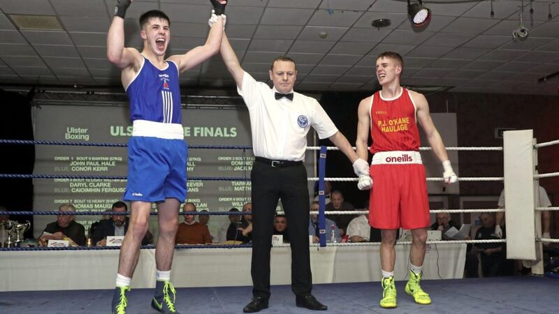Jack McGivern has his hand raised after a split decision win over Dominic Bradley in last night&#39;s light-welter semi-final at the Ulster Elite Championships. Picture by Declan Roughan 