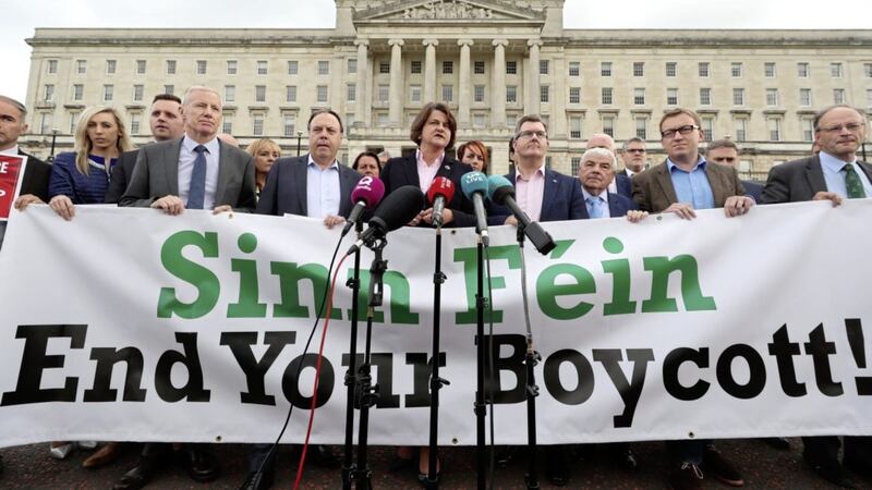 Arlene Foster and DUP colleagues mark 589 days since the collapse of power-sharing by unveiling a &#39;Sinn F&eacute;in - End Your Boycott&#39; banner. Picture by Liam McBurney/PA Wire 