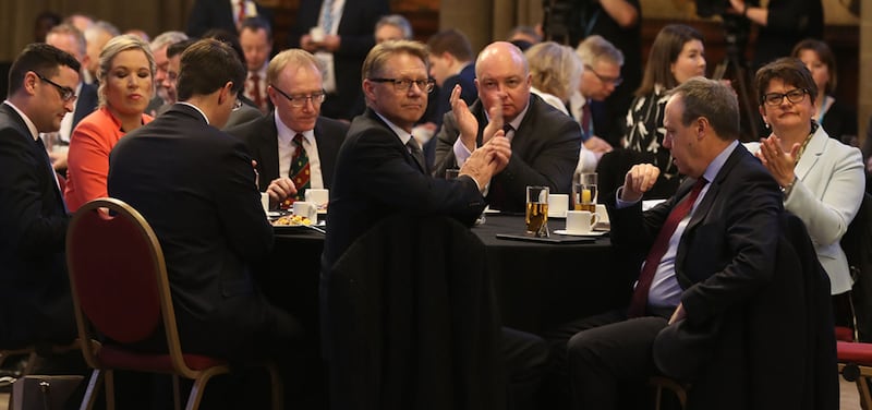 DUP leader Arlene Foster and Sinn F&eacute;in's leader in the north Michelle O'Neill with Secretary of State James Brokenshire attend the Ulster fry breakfast at Manchester Town Hall during the Conservative Party Conference at the Manchester Central Convention Complex &nbsp;