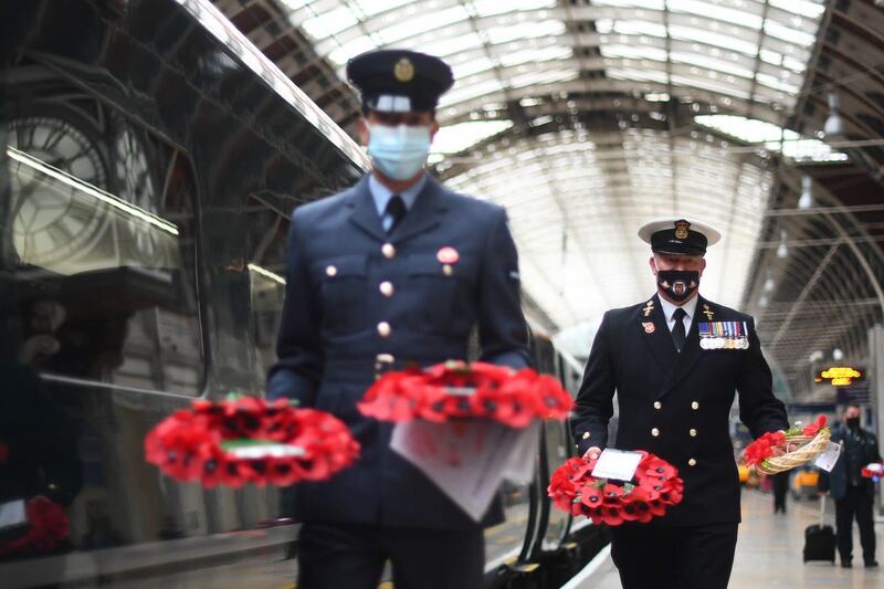 The wreaths arrived at Paddington station in time for a remembrance service at 11am (Victoria Jones/PA)