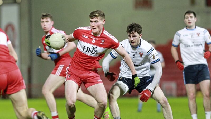 Derry&#39;s Jack Doherty with Rory Brennan of Ulster University during the McKenna Cup opener at Celtic Park. Picture Margaret McLaughlin 