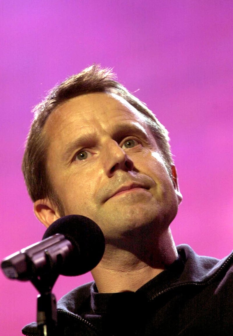 Jeremy Hardy performing on stage 