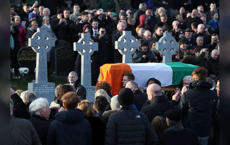 &nbsp;The coffin of Martin McGuinness is carried into the cemetery. Picture by Brian Lawless, PA