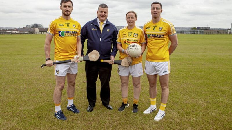 Club Aontroma&#39;s new chairman Niall Murphy gets a helping hand to relaunch the supporters club from Conor McCann (Antrim hurling captain), Ladies footballer Emma Kelly and Antrim football captain Declan Lynch 