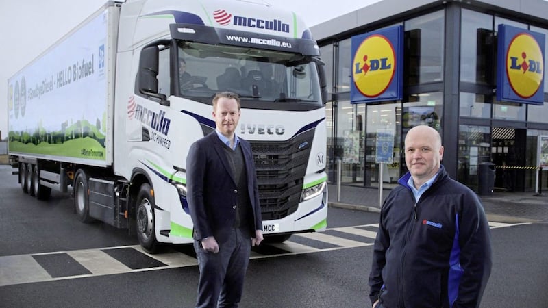 Pictured with one of the new trucks are Conor Boyle (left), regional director of Lidl NI, and Ashley McCulla, chairman of McCulla Transport 