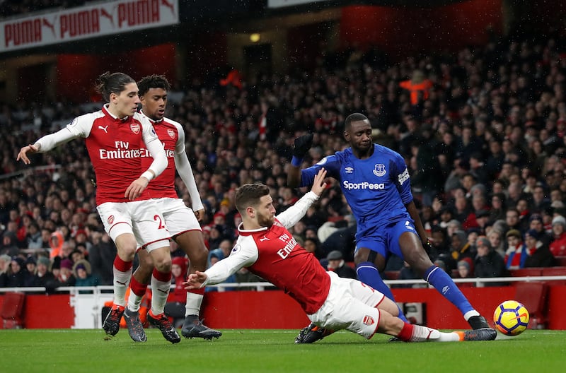 Arsenal's Shkodran Mustafi makes a tackle against Everton