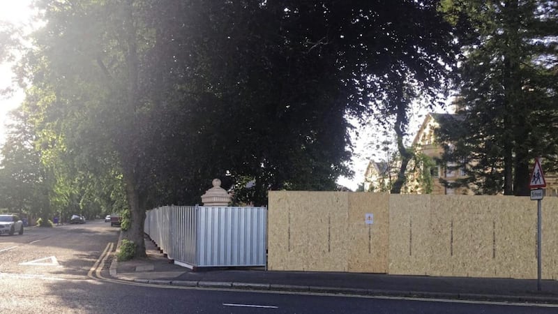 The wooden hoarding erected around part of the Chinese Consulate on Malone Road in south Belfast 