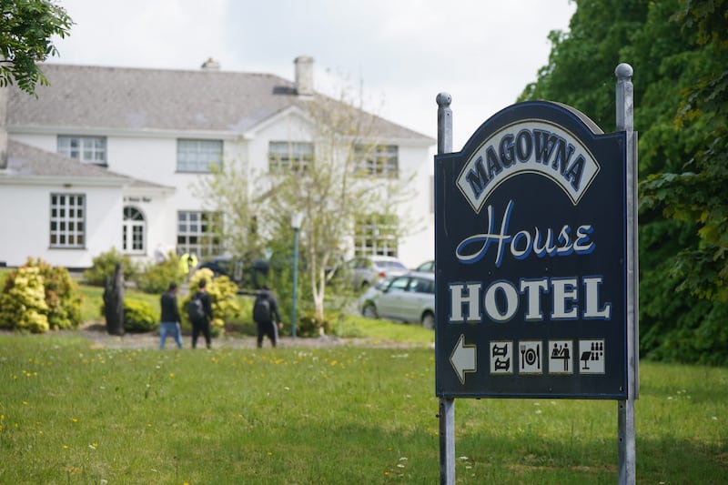 Asylum seekers leaving the grounds of the Magowna House hotel in Inch, Co Clare