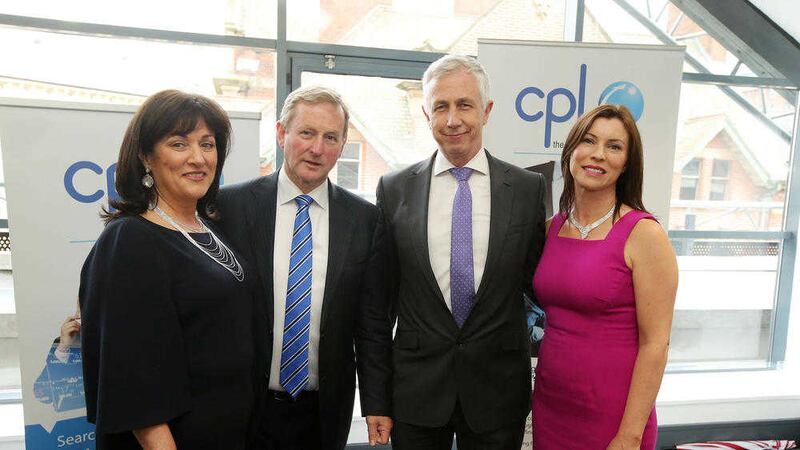 Taoiseach Enda Kenny at Cpl&rsquo;s new Belfast offices with Anne Hearty co-founder and CEO of Cpl Resources, John Hennessy and &Aacute;ine Brolly, CEO of Cpl Northern Ireland 