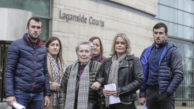 Bridie Brown, the widow of murdered GAA official Sean Brown, and family members at Laganside Court complex. Picture by Hugh Russell. 