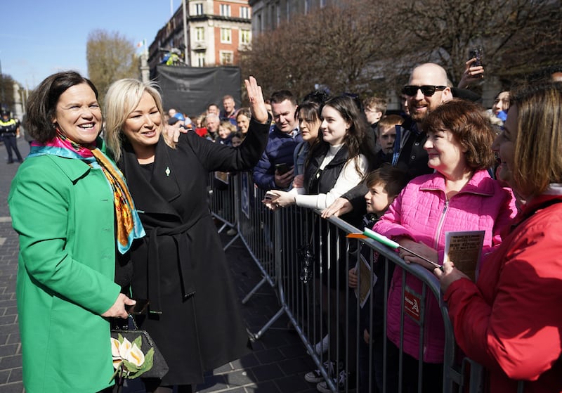 Sinn Fein president Mary Lou McDonald (left) and First Minister Michelle O’Neill meet members of the public after the ceremony