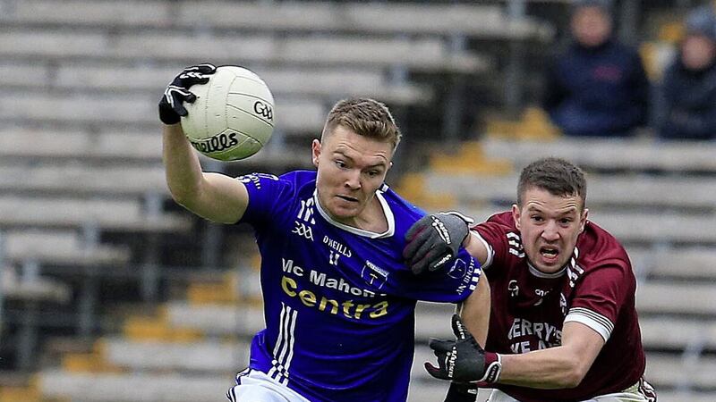 Scotstown's Conor McCarthy in action against Ballybay's Ryan Wylie. Pic: Philip Walsh 