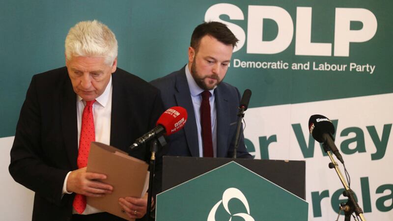 Former SDLP leader and South Belfast candidate Alasdair McDonnell pictured with current leader Colum Eastwood at the party's General Election manifesto launch today. Picture by Hugh Russell&nbsp;