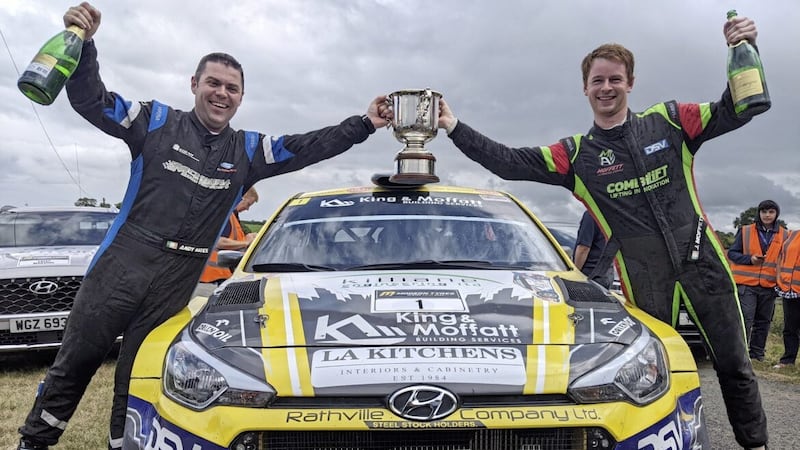 Josh Moffett (right) and Andy Hayes celebrate winning the Irish Tarmac Rally Championship title for a second time at the finish of the 2022 Modern Tyres Ulster Rally. 