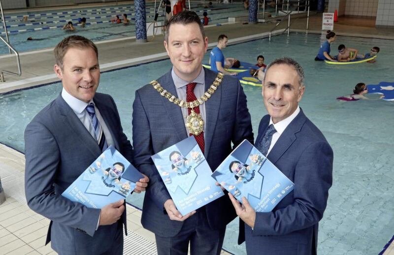 Pictured at Olympia Leisure Centre are, left to right, Gareth Kirk, regional director of GLL, Lord Mayor of Belfast, Councillor John Finucane, and John McGuigan, chair of Active Belfast Limited. Picture by Darren Kidd 