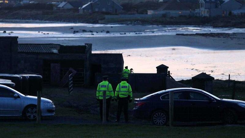 Police at the scene at Tyrella Beach where a body was found on Tuesday. Picture by Mal McCann 
